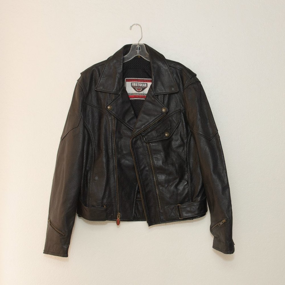 FirstGear (Chief) Motorcycle jacket, black w many pockets, breathable membrane.